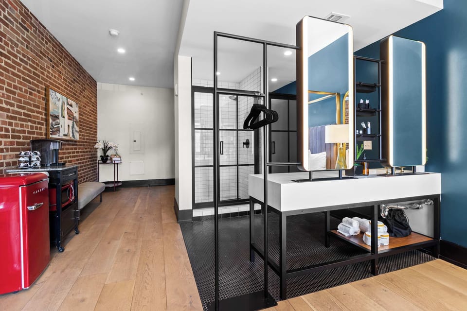 Stay organized with an open wardrobe featuring hanging space, shelves, and luggage storage—designed to keep everything within easy reach during your stay.