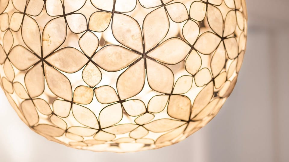 A statement pendant light adds character and style to the interior.