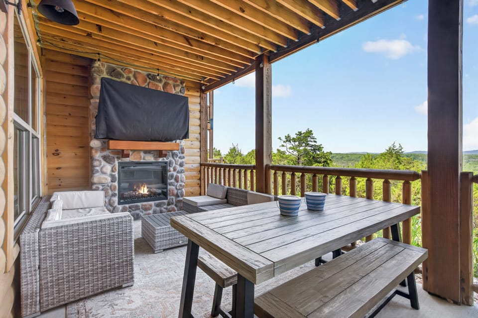 Enjoy the fresh air and lake views from the bottom floor deck just off the kitchen and living room