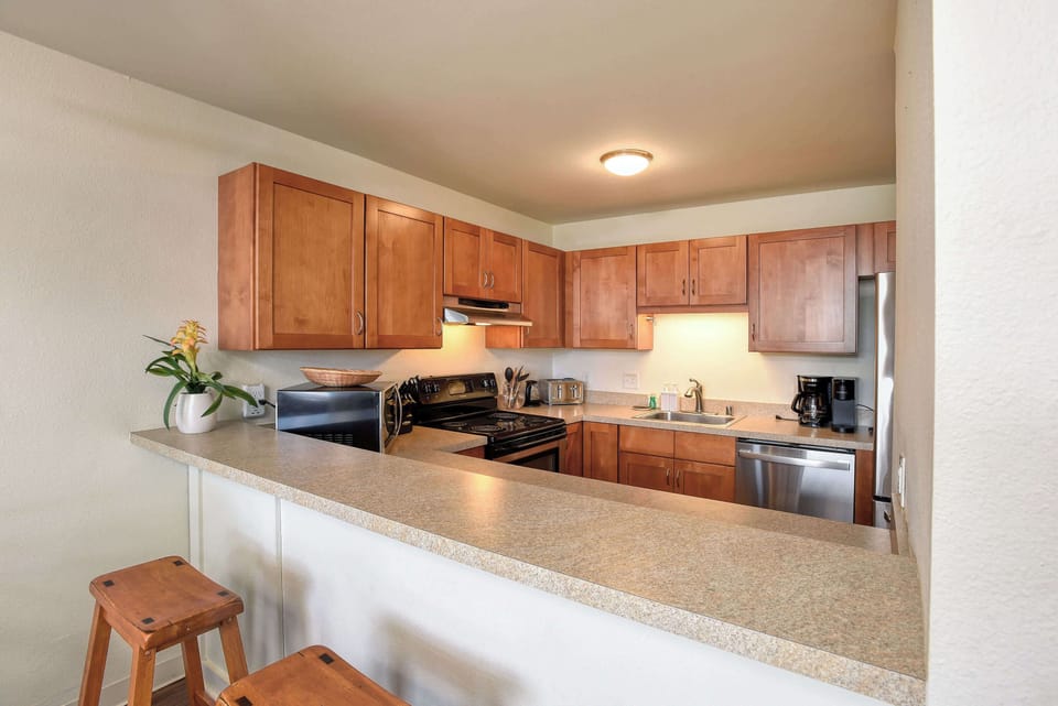 Spacious Kitchen With Convenient Breakfast Bar
