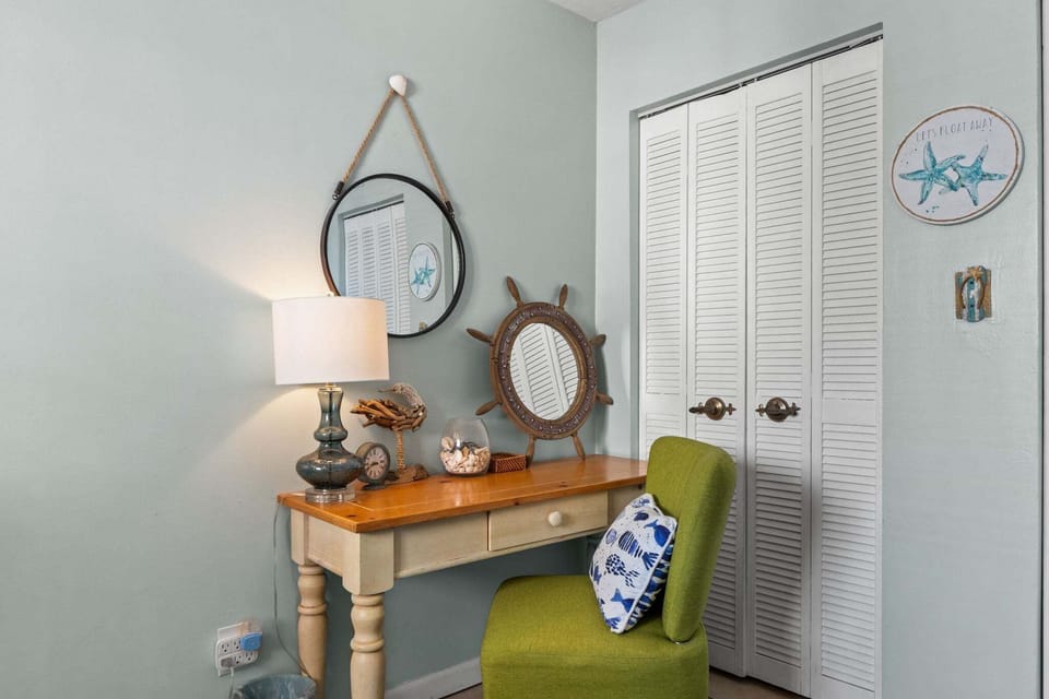 A dedicated desk provides a convenient spot for work or study.
