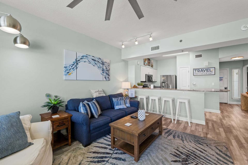 The open layout flows directly into the living room, creating a bright and connected space for everyone to enjoy.