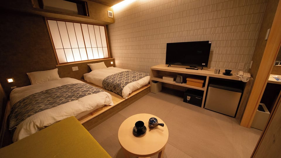 Japanese-style Twin Room, 2 Bedrooms, Non Smoking | In-room safe, WiFi (free), bed sheets