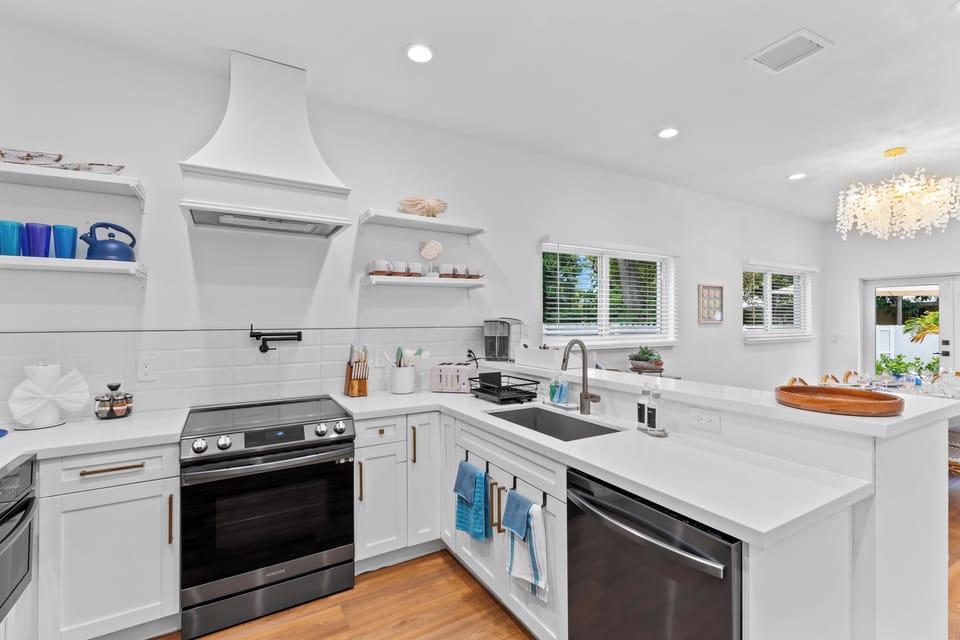 Chef's kitchen featuring premium appliances and ample counter space.