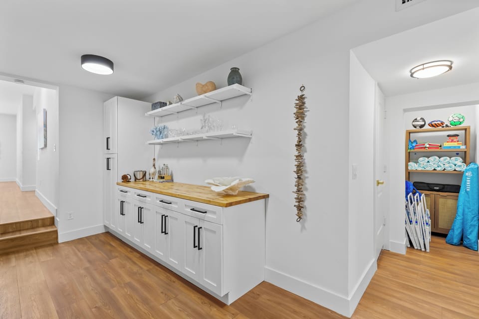 Dedicated coffee and beverage bar with extra storage.