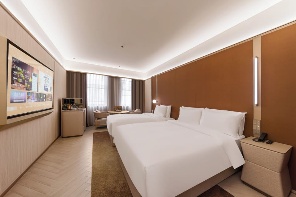 Family Triple Room | Down comforters, memory foam beds, minibar (free items), desk