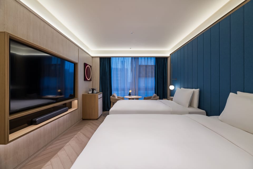 Executive Twin Room | Minibar (free items), blackout drapes, iron/ironing board (on request)