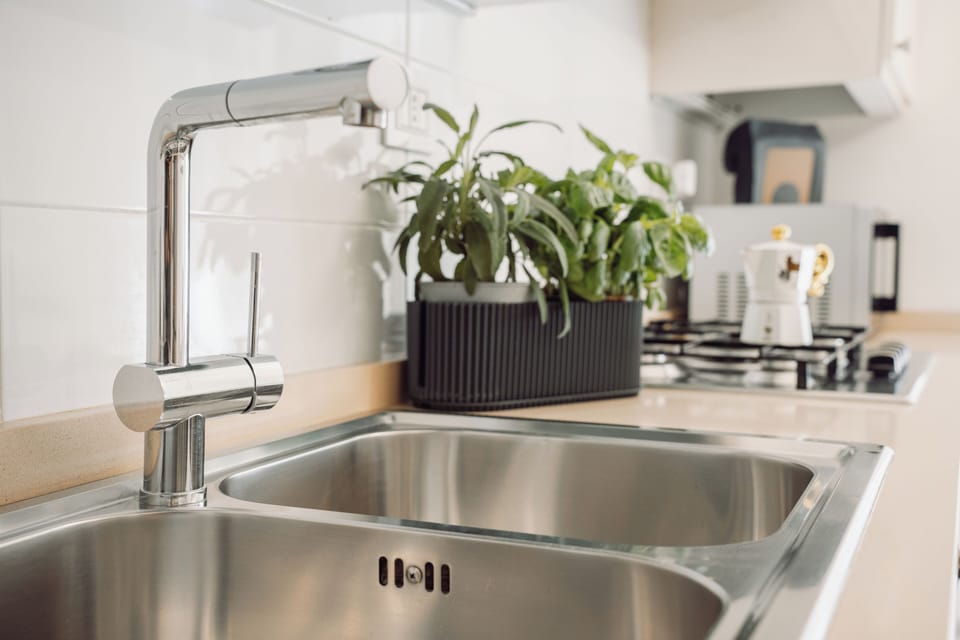 Comfort Apartment | Private kitchen | Espresso maker, coffee/tea maker, electric kettle, highchair