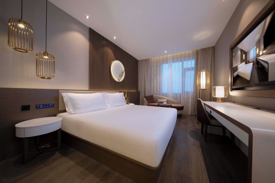 Luxury Double Room, City View | Down comforters, minibar (free items), in-room safe, desk