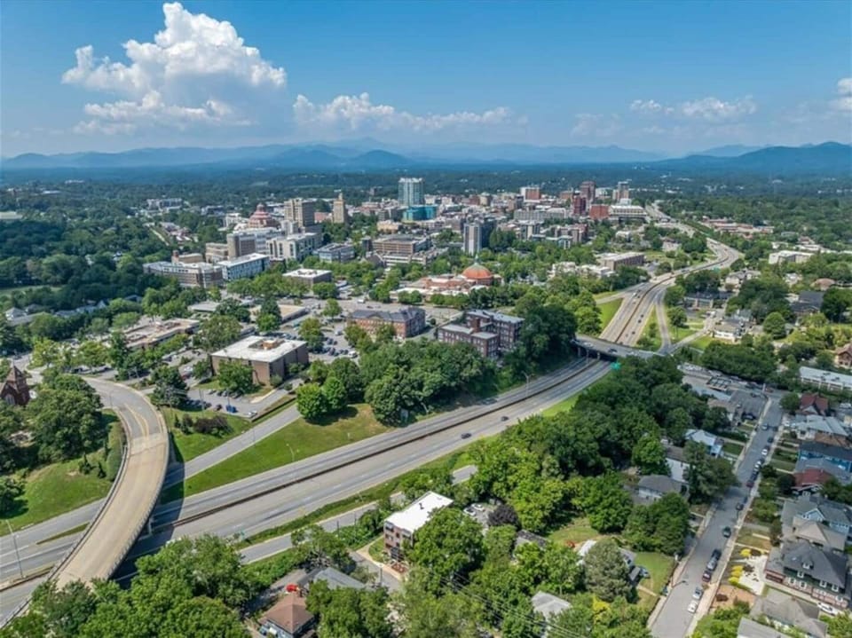 Aerial view showing the property's convenient location near downtown Asheville and major roadways.