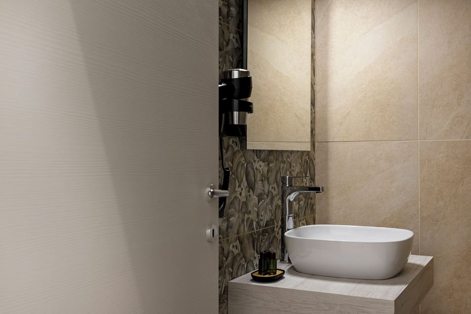 Townhome, Balcony, City View | Bathroom | Shower, free toiletries, hair dryer, slippers