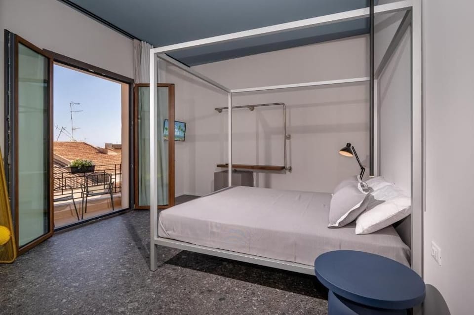 Double Room, Balcony, Partial Sea View | Blackout drapes, soundproofing, iron/ironing board (on request)