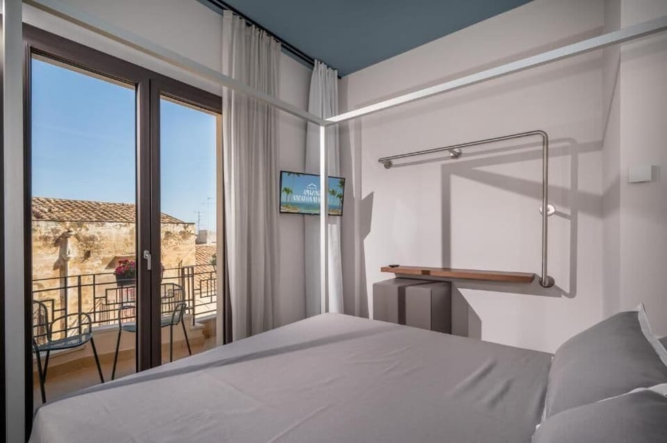 Double Room, Balcony, City View | Blackout drapes, soundproofing, iron/ironing board (on request)