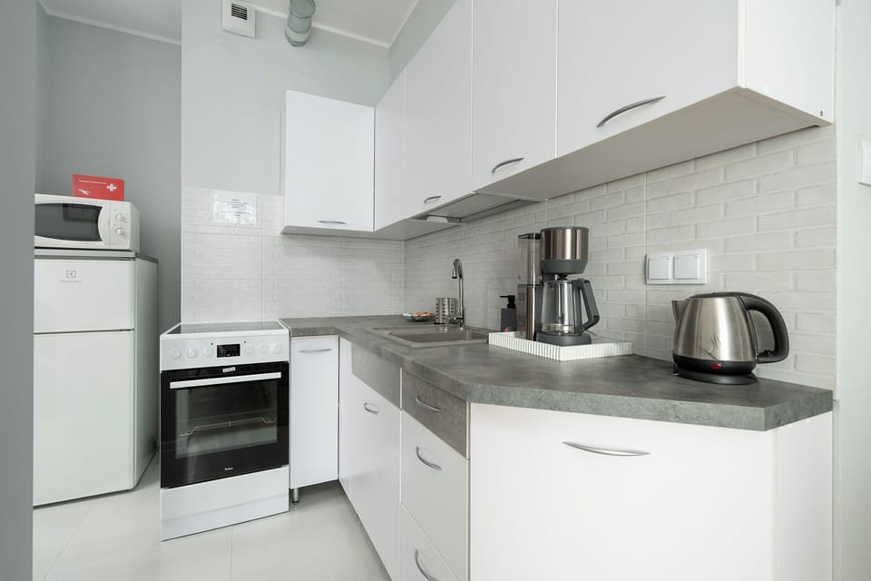 Apartment, Balcony | Private kitchenette | Fridge, stovetop, cookware/dishes/utensils
