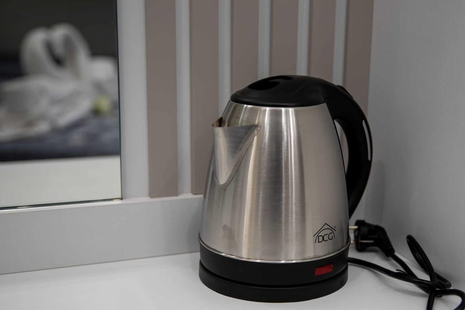 Deluxe Room, Balcony | Coffee and/or coffee maker