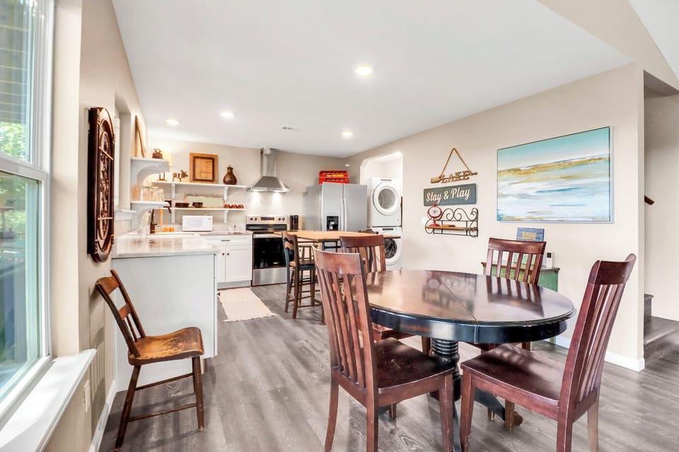 Gather around the table for meals in this warm, open-plan dining and kitchen space, complete with charming Hill Country touches and everything you need to feel right at home.