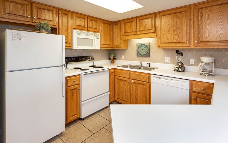 Condo, 2 Bedrooms | Private kitchen | Coffee/tea maker, fridge, oven
