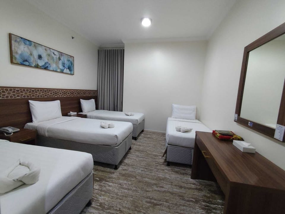 Quadruple Room | Bed sheets