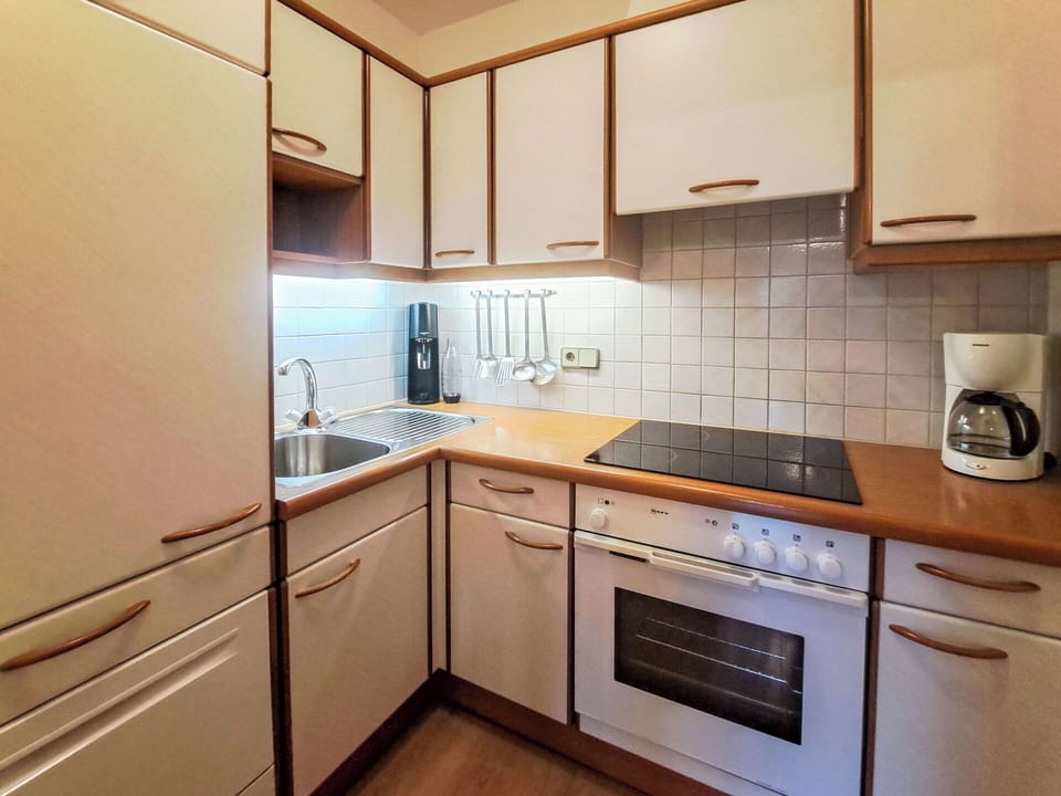 Kitchen, Kitchen Appliance, Countertop, Major Appliance, Cabinetry, Wood, Flooring, Interior Design, Kitchen Sink, Sink