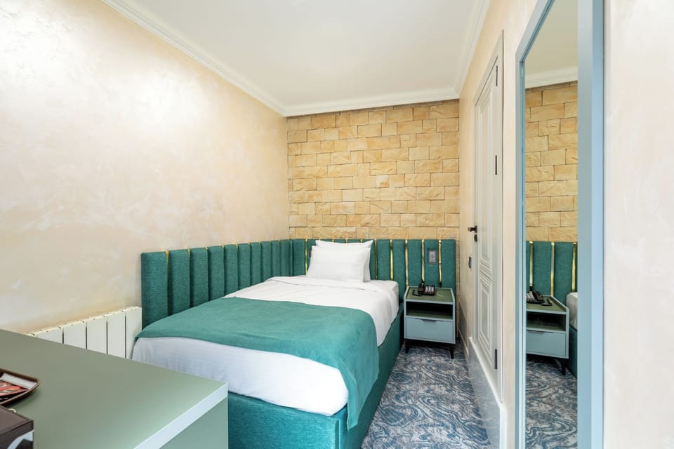 Economy Single Room, City View | Hypo-allergenic bedding available, minibar, in-room safe, desk