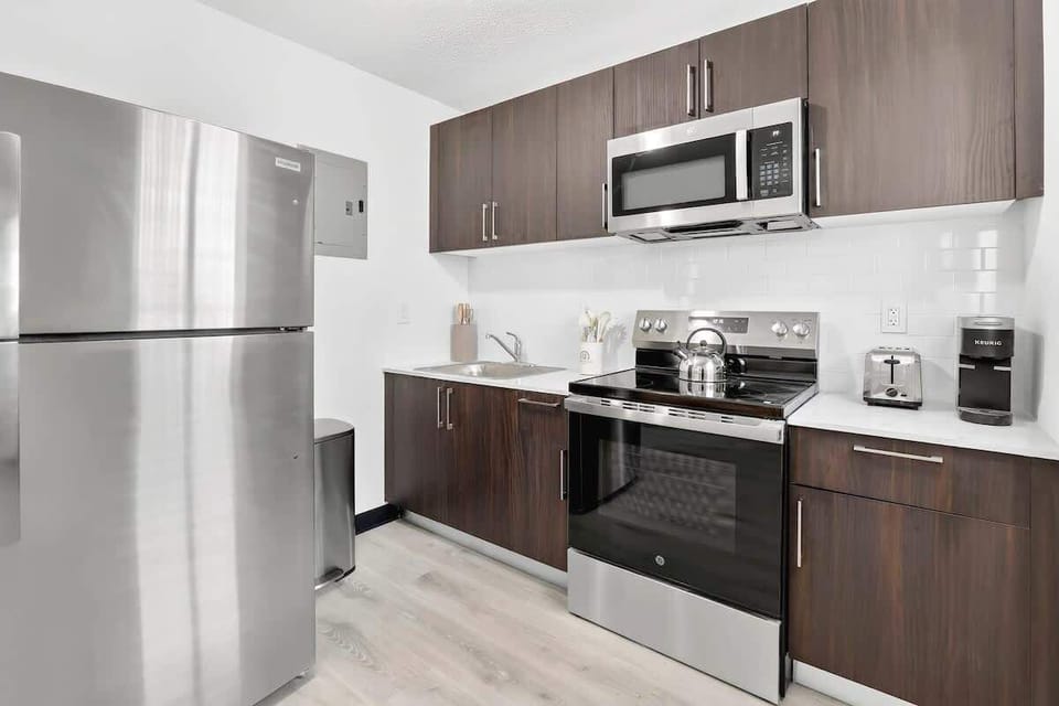 Cook your favorite meals in the fully equipped kitchen with all the essentials for a convenient stay.