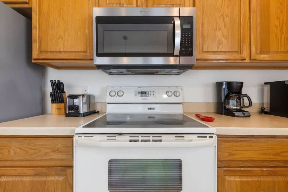 Fully stocked kitchen with modern appliances and everything you need to cook at home