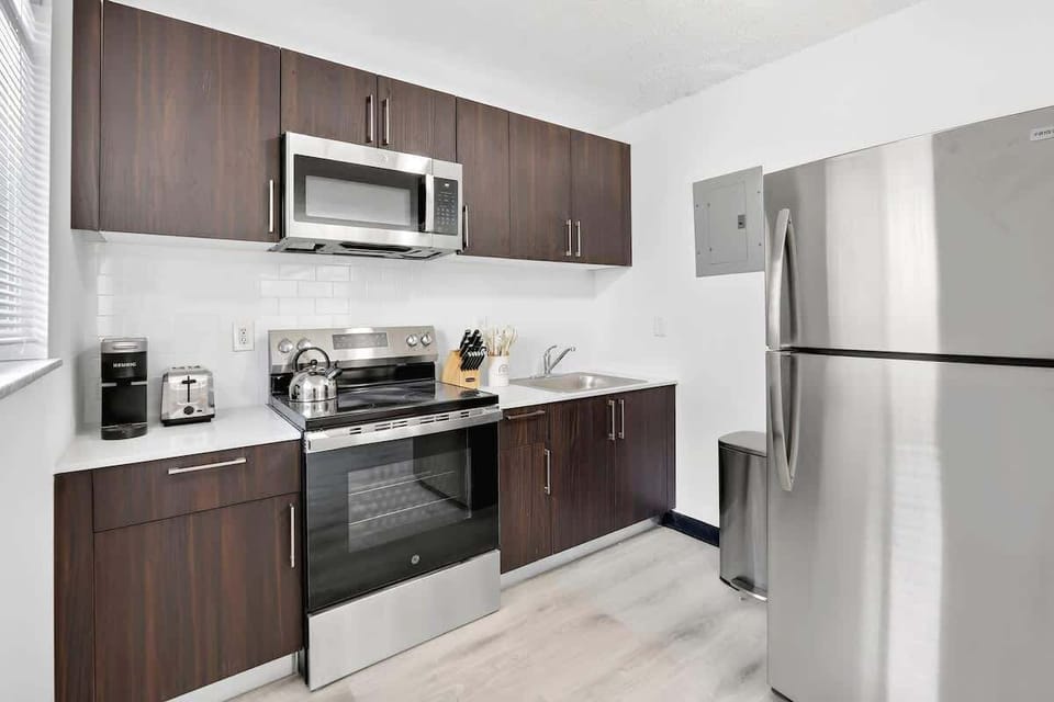 Cook your favorite meals in the fully equipped kitchen with all the essentials for a convenient stay.