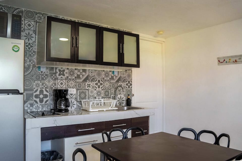 Practical kitchenette and dining space for relaxed meals in your studio