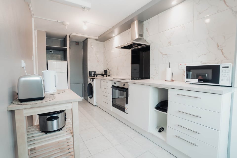 Toaster, kettle, microwave, oven and hob, plus a Nespresso machine and coffee to go with it. Make breakfast in your pyjamas rather than queueing for a hotel buffet. Pots, pans, oil, salt and pepper all provided.