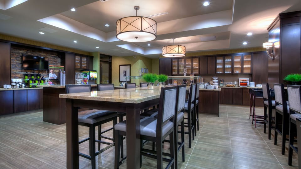 Enjoy your culinary favorites in a spacious dining area, perfect for gatherings.