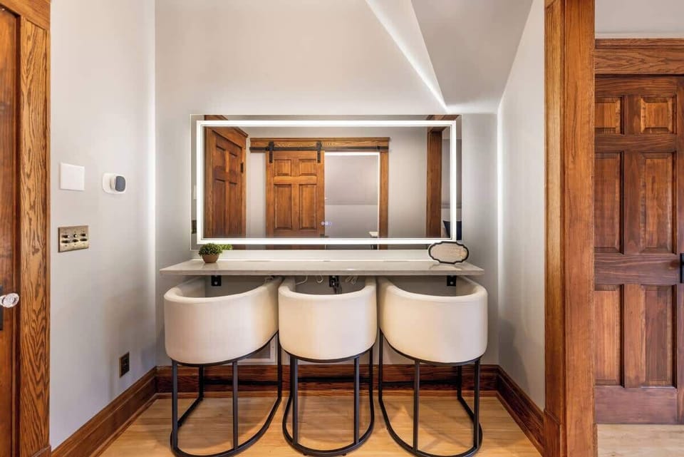 Get ready together with ease—this dedicated vanity area offers plenty of space and lighting for mornings, nights out, and everything in between.