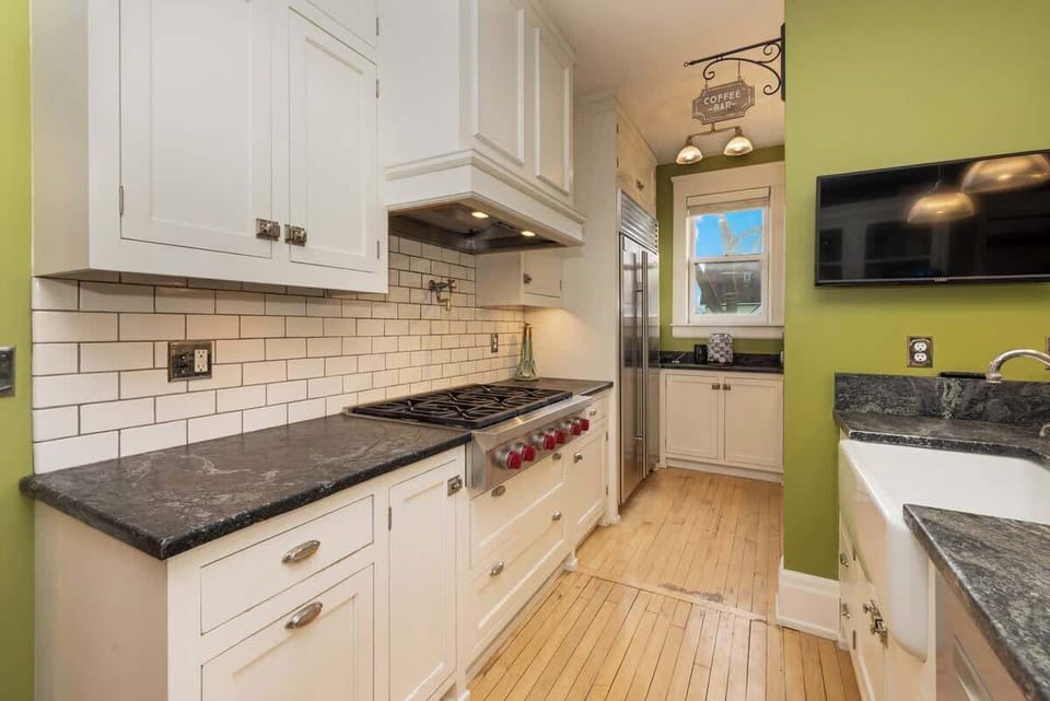 Cook with ease in a fully equipped kitchen featuring generous counter space and a professional-style range—perfect for everything from quick breakfasts to shared dinners.
