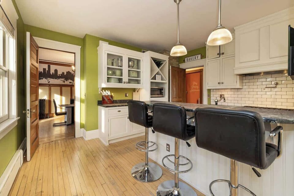Pull up a stool and start the day with coffee or wind down with a drink at the kitchen bar—perfect for casual meals, conversation, and keeping the cook company.