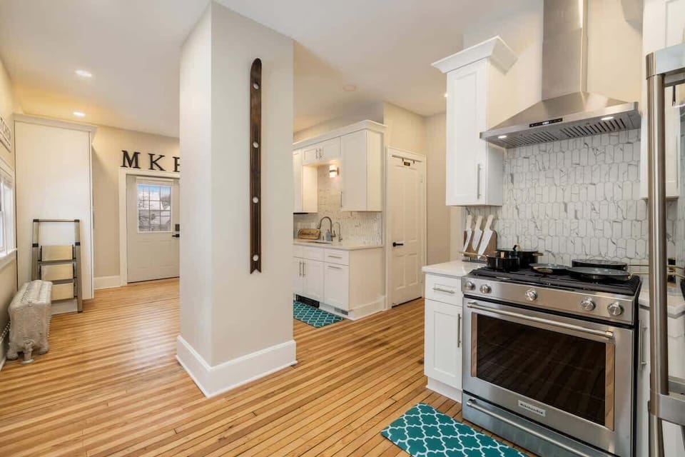 Move easily through this open, light-filled kitchen where cooking feels relaxed and connected—perfect for preparing meals, grabbing snacks, and staying part of the conversation as the day unfolds.