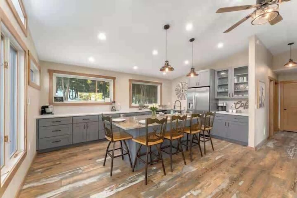 Dining area with seating for 8 and open access to the kitchen