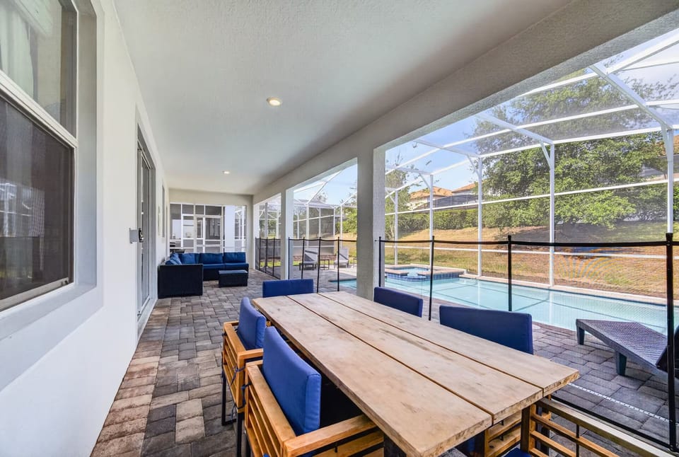 Outdoor dining table beside the pool