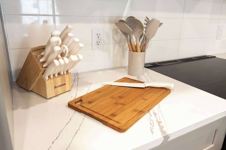 Fully stocked utensils and knife block.