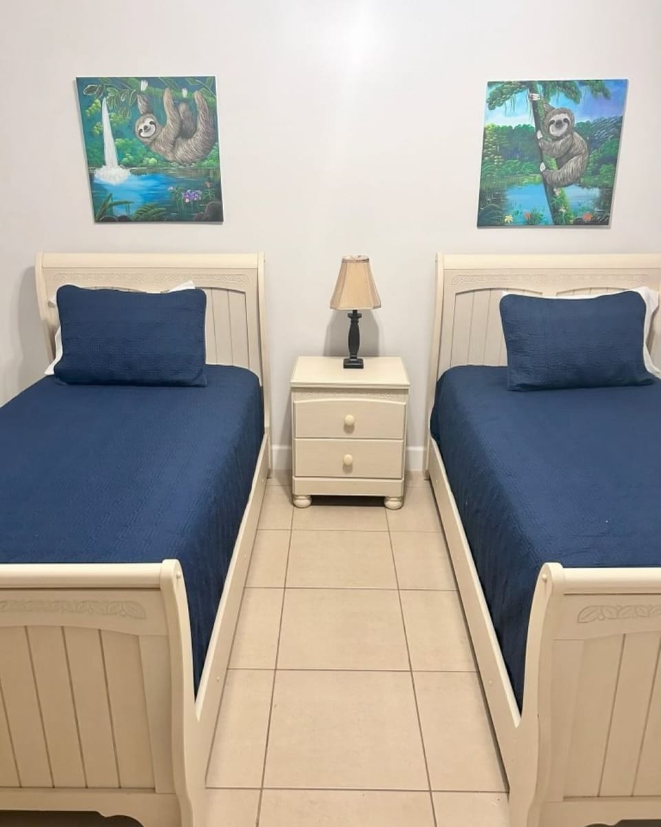 Can push both beds together and make King if needed.