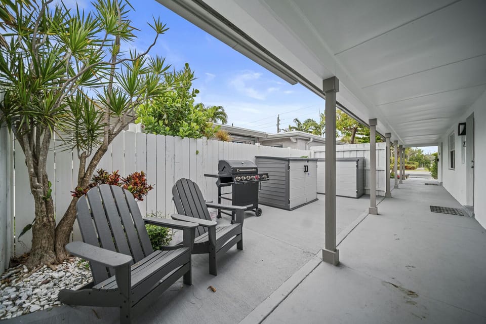 Outdoor seating on your front porch with BBQ grill for your use