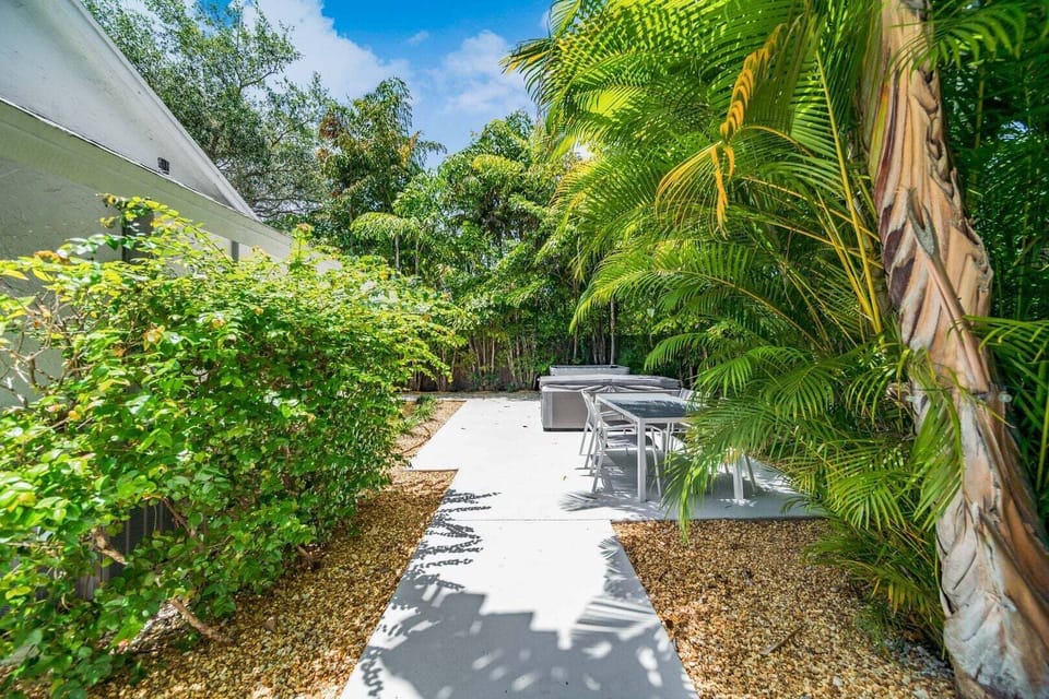 Good sized private yard area with hot tub, cold plunge and dining table