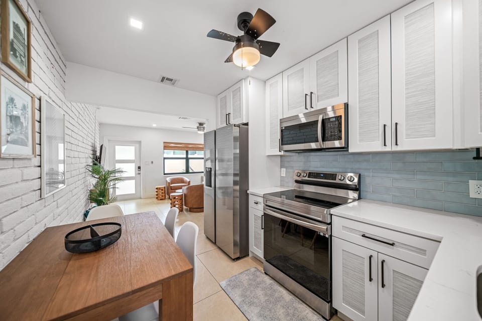 Fully stocked kitchen with
cookware and utensils