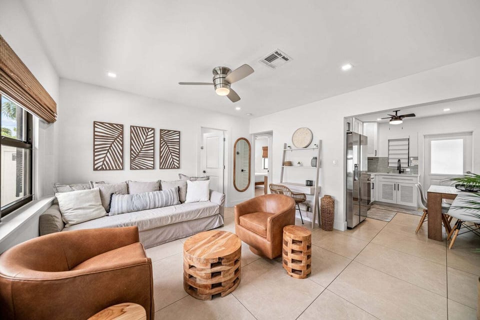 Bright and airy living room/kitchen with a workspace