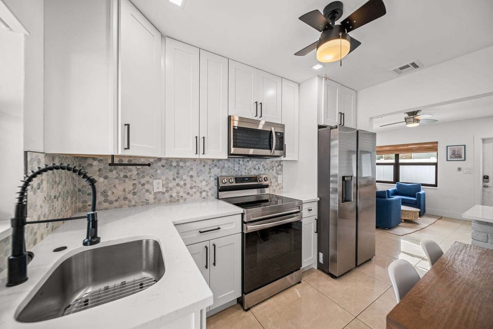 Fully stocked kitchen with
cookware and utensils