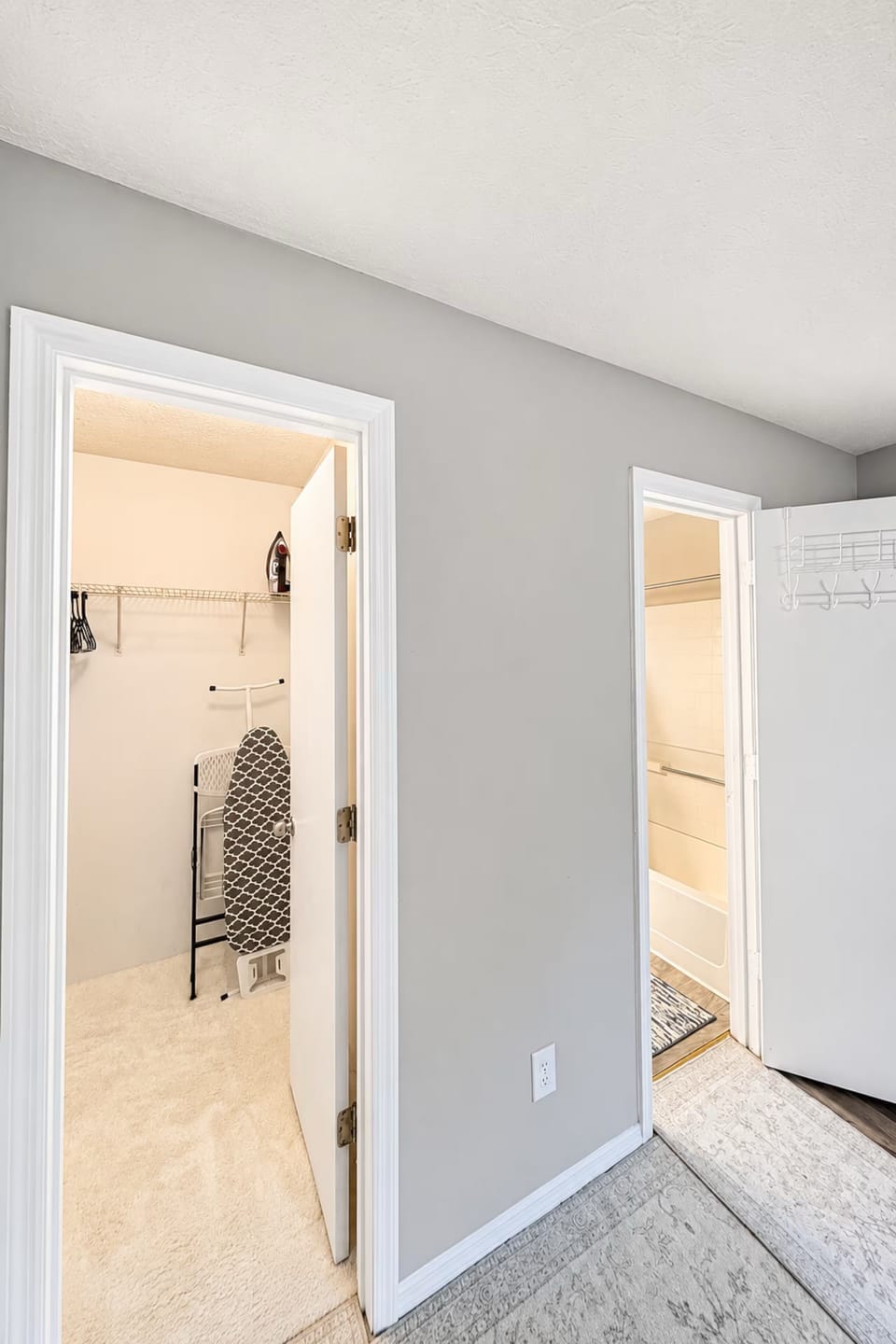 Primary bedroom layout with direct access to the private bathroom and closet.