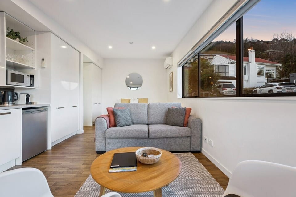Spacious open-plan lounge with mountain views