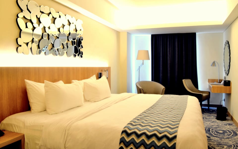 Premium bedding, in-room safe, desk, free wired internet