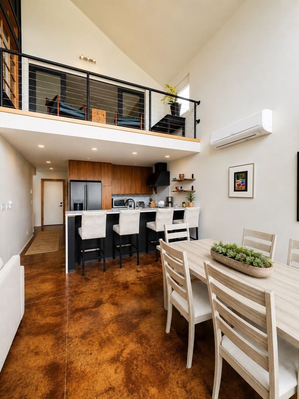 Modern kitchen with island seating and stainless appliances