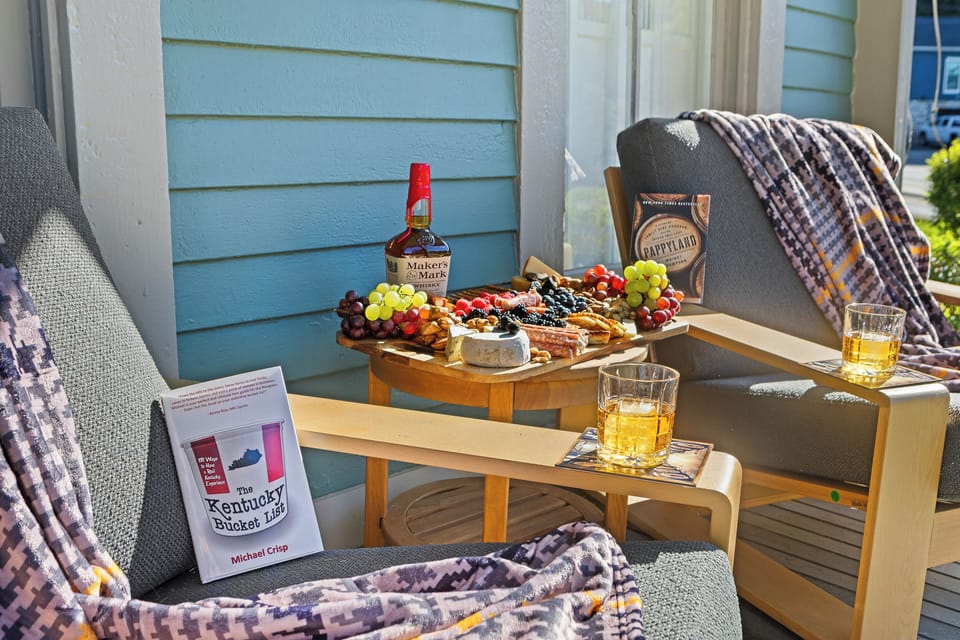 The porch is already stocked with Maker's Mark, a charcuterie board, and the Kentucky Bucket List to help you plan your days.
