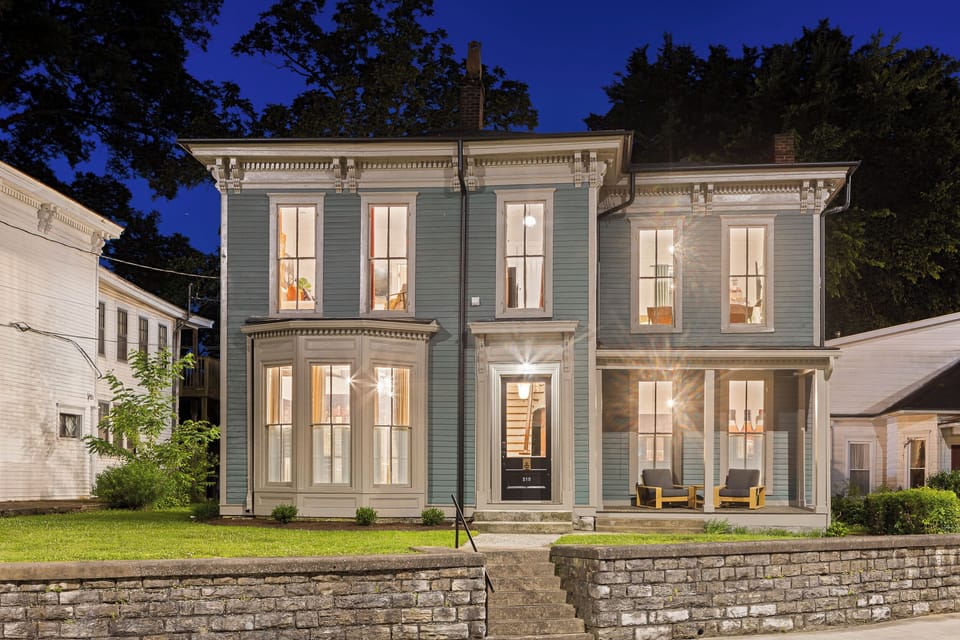 Welcome to Rickhouse Run! Classic Victorian architecture, a wrap-around porch, and a bourbon destination waiting just inside the front door.