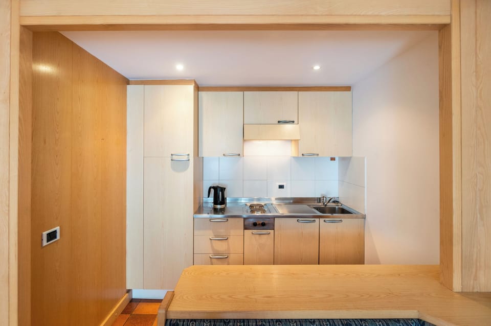 Apartment, 1 Bedroom | Private kitchen | Fridge, stovetop, electric kettle, cookware/dishes/utensils